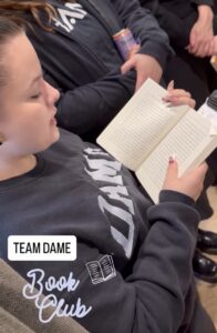 Dame Salon Spa team book club discussing The Four Agreements